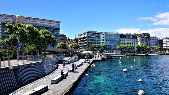 Geneva, Switzerland - June 20, 2020: The place where the Rhone river flows into Lake Geneva.