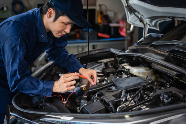 istock male mechanics check electrical wiring vehicle system in car service 1255167925