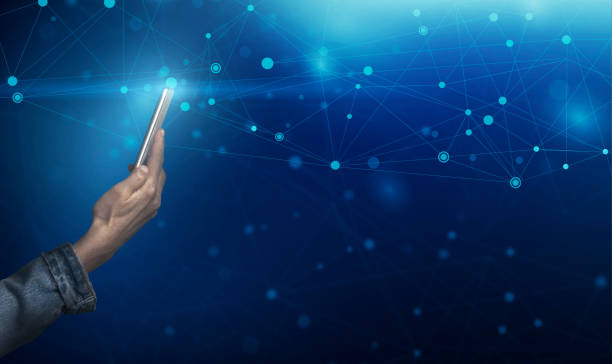 istock Worldwide connections and technologies. Collage with man holding mobile phone and mesh network, empty space 1255169441