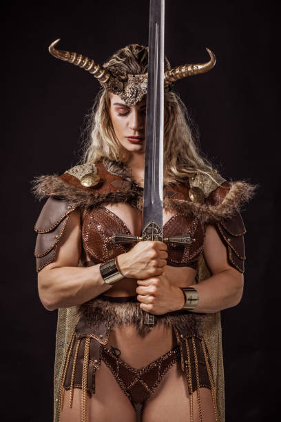 Blonde viking warrior female in studio shot