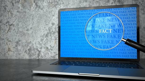 istock Fake News Loupe Facts Notebook 1255171795