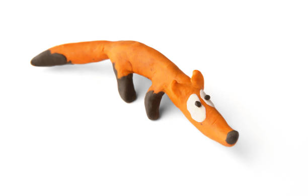 istock Cute fox made of plasticine isolated on white background. 1255171874