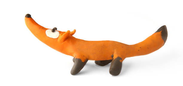 istock Cute fox made of plasticine isolated on white background. 1255172031