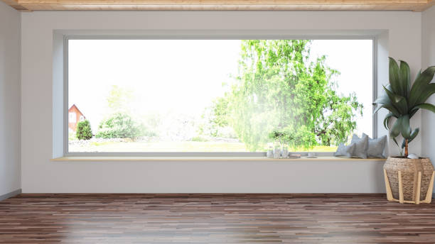 istock Wide Window View with Unfurnished Interior 1255175037