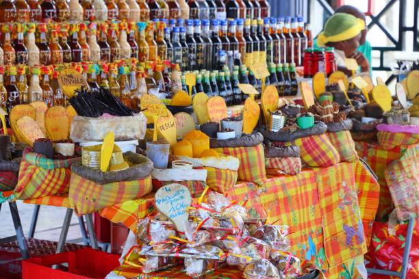 Souvenir market, Guadeloupe Souvenir shop with beverages and spices in Pointe-a-Pitre city, Guadeloupe. Pointe-a-Pitre is the biggest city of Guadeloupe. local products stock pictures, royalty-free photos & images