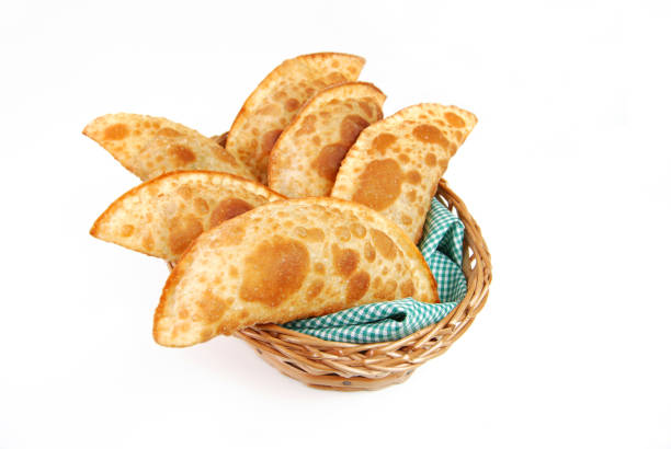 istock Traditional pastry called pastel in a basket in white background 1255178274