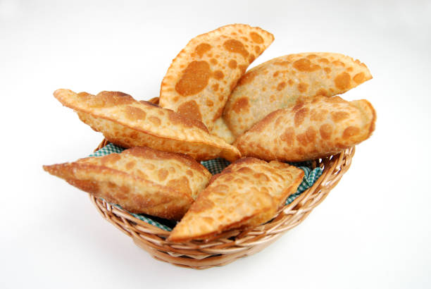 istock Traditional pastry called pastel in a basket in white background 1255178464