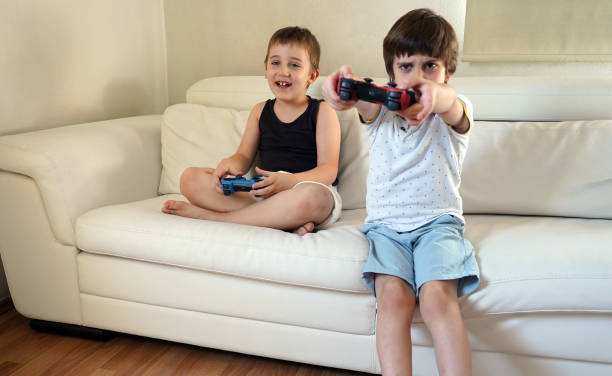 istock Children playing video games 1255180037
