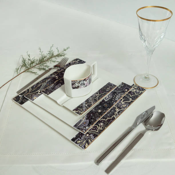 istock Set of clean tableware, dishes, plates, utensils on the table 1255180335
