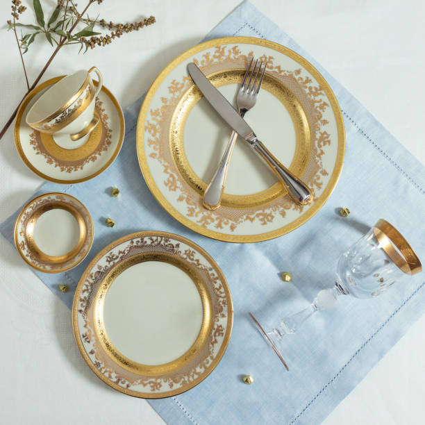 istock Set of clean tableware, dishes, plates, utensils on the table 1255180356