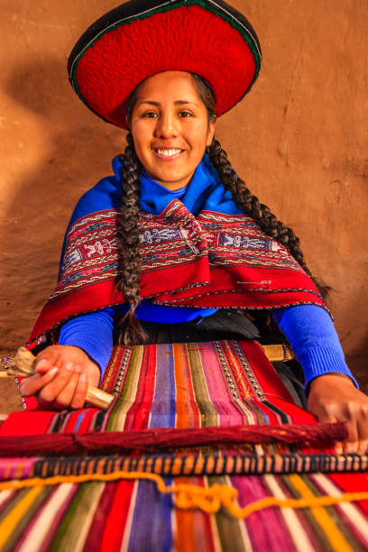 istock Peruvian woman weaving, The Sacred Valley, Chinchero 1255189934