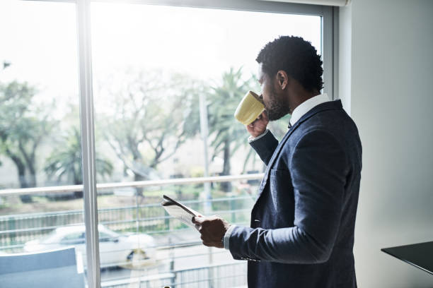 istock Catching up the day's headlines over a strong cuppa 1255190500