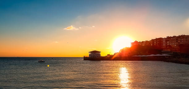 istock Sunset over the Historical Moda Pier in Istanbul, Turkey 1255196750