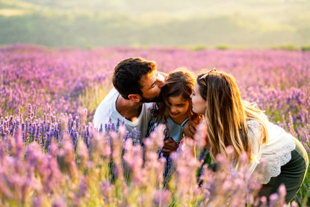 istock Happy family in lavender field 1255199016