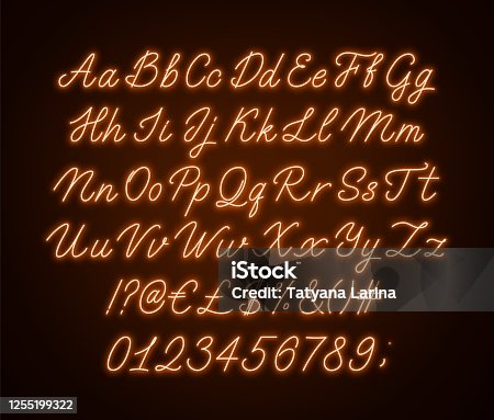istock Neon orange script alphabet. Glowing cursive font with letters, numbers and special characters. 1255199322