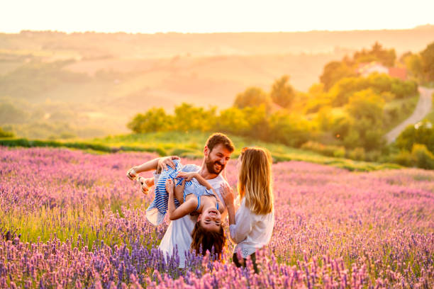 istock Happy family in lavender field 1255199893