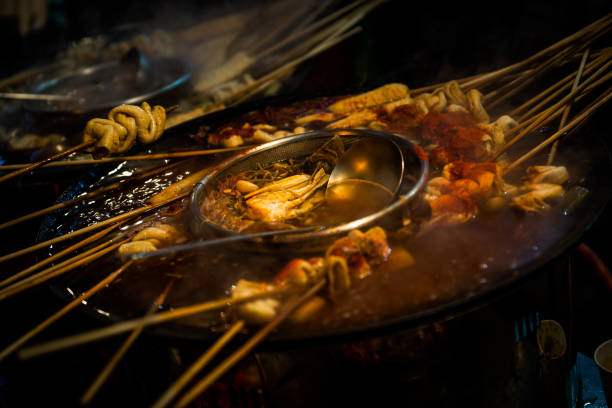 istock Asian meat stick in hot pot 1255200884