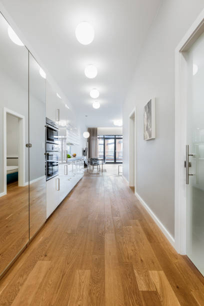 istock White corridor with wooden floor 1255201576