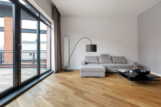 istock Simple living room with wooden floor 1255201584