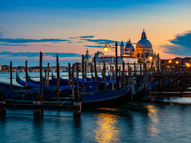 istock Gondole in Venice at sunset Italy 1255204719