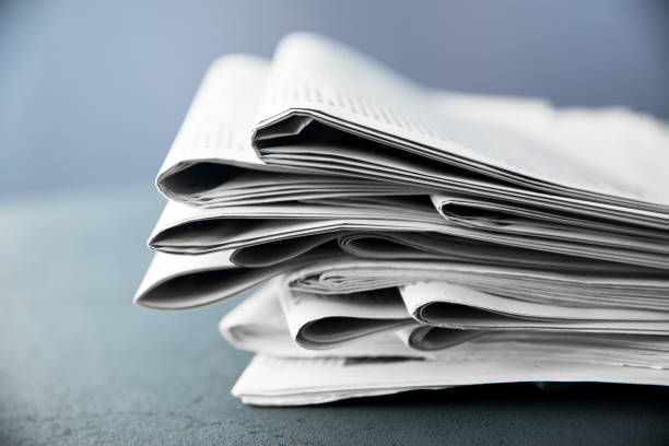 istock tack of newspapers 1255205728