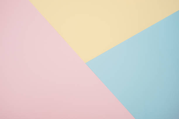 istock Abstract geometric color paper background. Copy space backdrop for your design or text, wedding greeting, postcard 1255211481