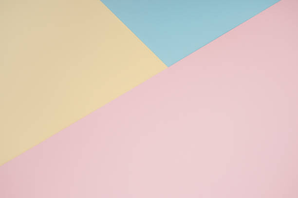 istock Abstract geometric color paper background. Copy space backdrop for your design or text, wedding greeting, postcard 1255212029