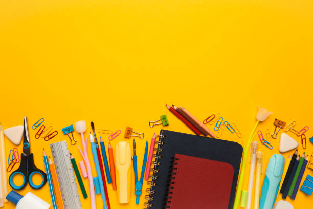 istock Back to school, items on yellow background. Welcome to learning. Sale accessories for knowledge, retail. Study shopping. Copy space for text 1255213524