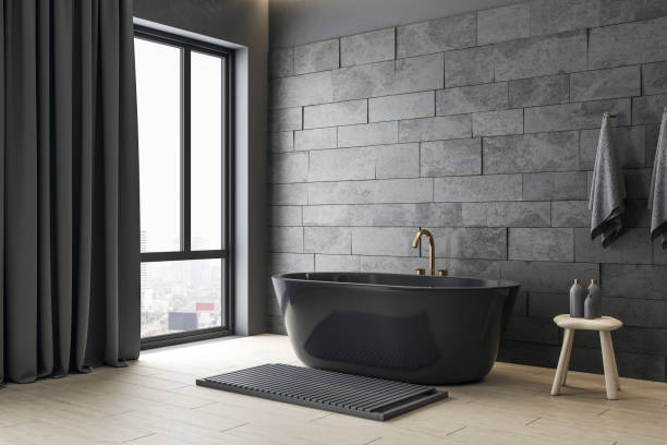 istock Gray bathroom with blank banner on wall and self care products. 1255215407