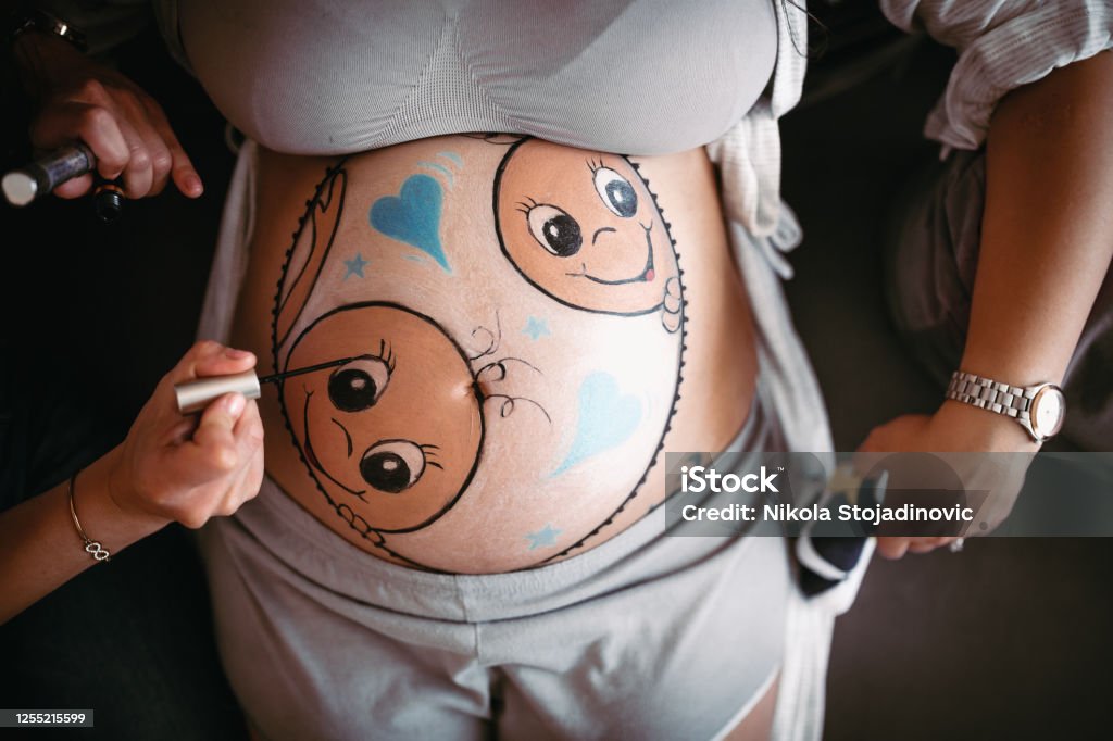 Pregnant woman belly close up Human Abdomen Stock Photo