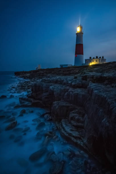 istock Portland Bill Lighthouse at night 1255216600