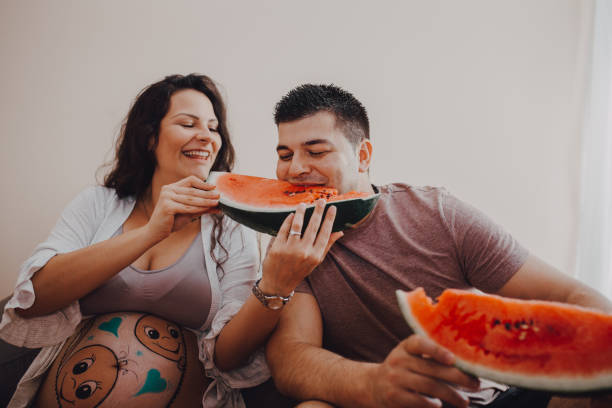 istock Pregnant couple eating healthy 1255216903