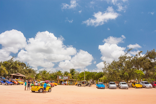 March 3, 2020 - Natal, Rio Grande Do Norte, Brazil: Group of Dune Buggys parked outside Genipabu lagoon in a sunny summer midday in Natal.