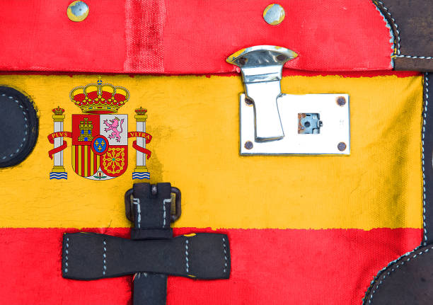 The Spain flag is in texture. Template. Coronavirus pandemic. Countries are closed. Locks.