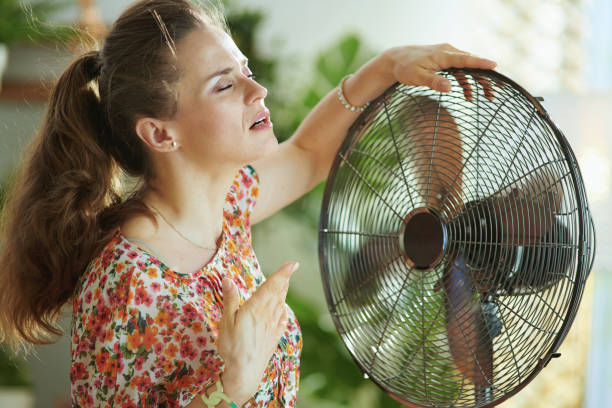 istock young woman feeling summer heat 1255220819
