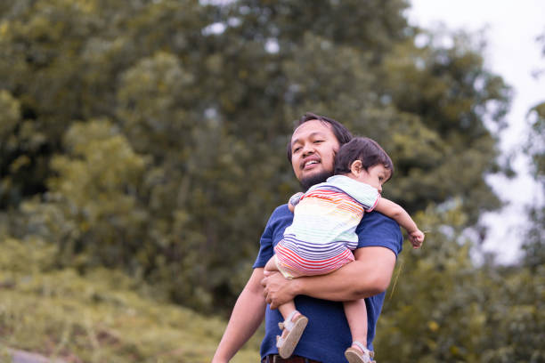 istock Malay family going for a simple hiking during a sunny day 1255220965