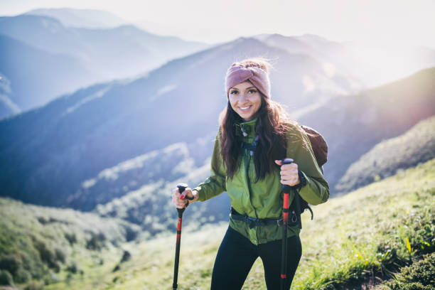 istock A Happy Female Smiles While Hiking In The Mountains. 1255221865