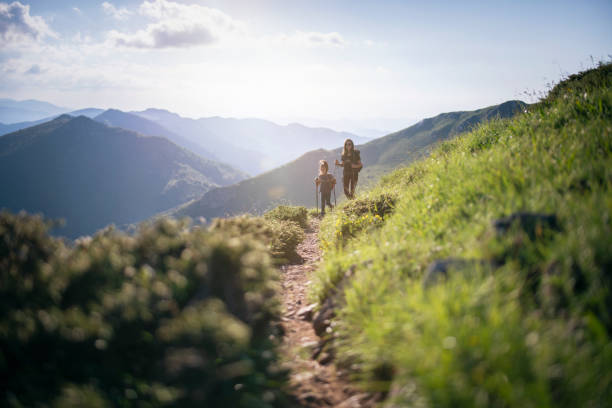 istock Family Hiking In Mountains. 1255221873
