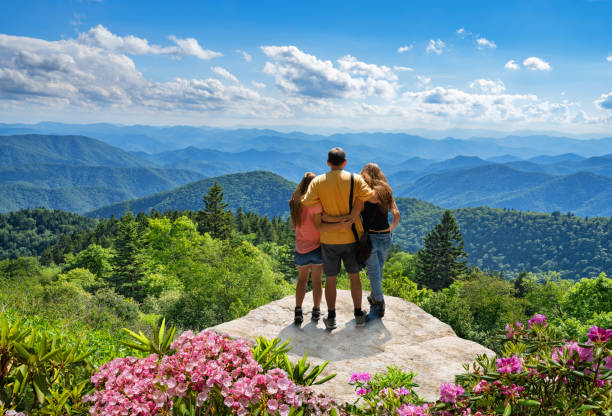 People enjoying beautiful mountain view.