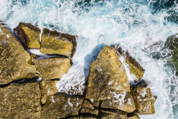 istock Waves hitting the rocky coast. 1255222657