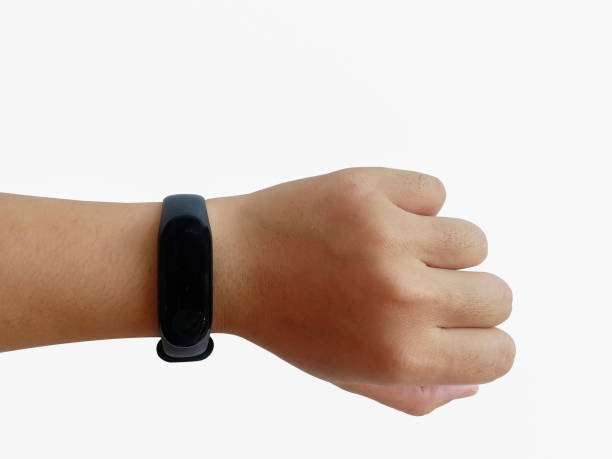 istock fist arm and smart watch on white background. 1255225203