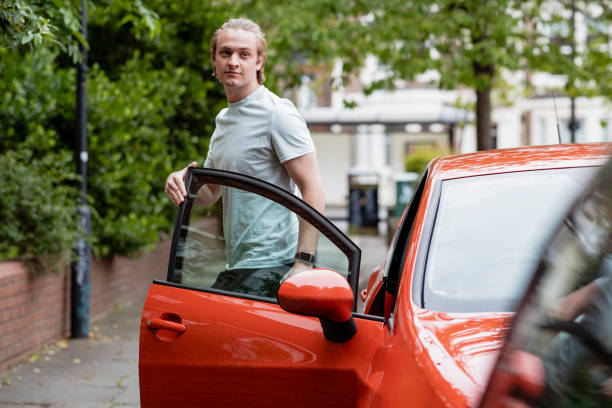 istock Stepping Out of Car 1255226074