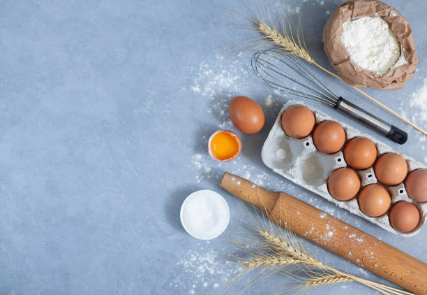 istock Bakery background top view raw ingredients for cooking pie 1255227305