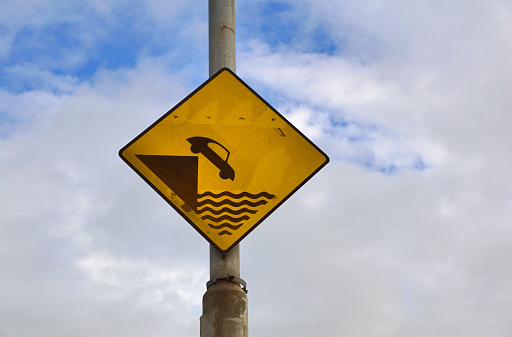 Traffic sign: Car crashes into the water, Howth, Ireland