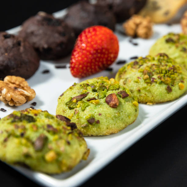 istock Tasty chocolate cookies with a tea cup 1255231309