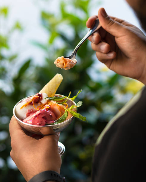 istock Man eating tasty ice cream 1255234827