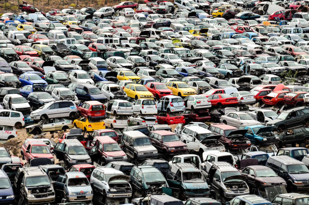 istock Old Junk Cars On Junkyard 1255235718