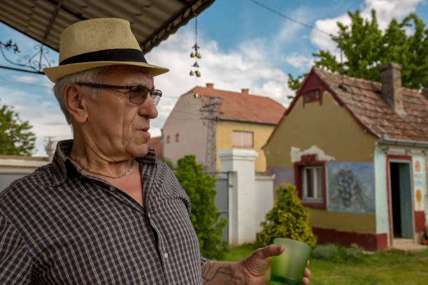 istock Mature happy bald man smiling the outside 1255239470