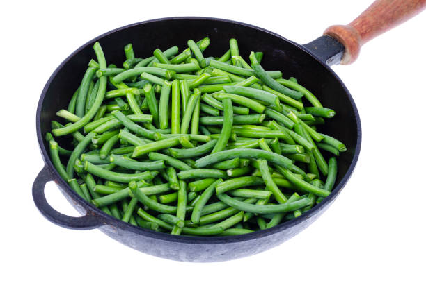 istock Green fresh green beans in frying pan 1255241588