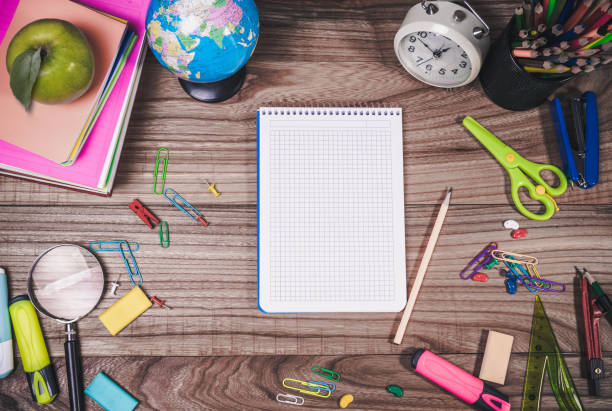 istock back to school concept. stationery items on blackboard 1255243785
